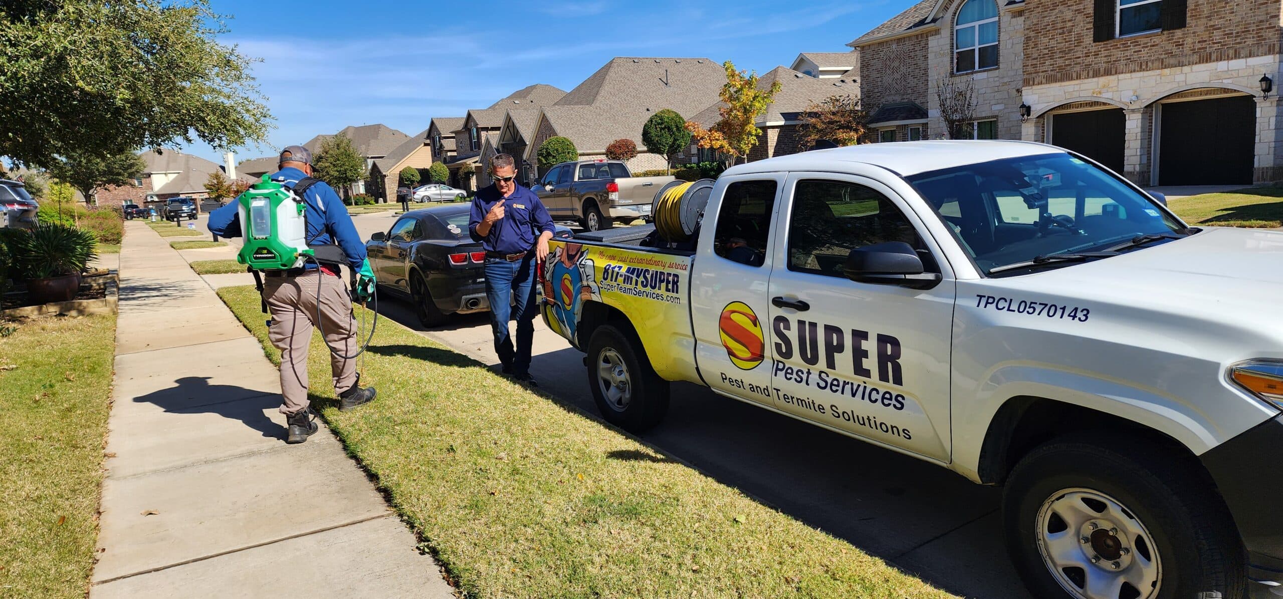 Super Pest Services technicians treating a Dallas–Fort Worth home